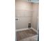 This functional laundry room features wood flooring and a wire shelf for storage at 200 N Kayla Dr, Salisbury, NC 28146