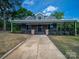 Charming home featuring a full porch, brick foundation, and beautiful curb appeal at 217 S Green St, Wadesboro, NC 28170