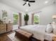 Bright main bedroom with large windows, hardwood floors, and neutral decor at 217 S Green St, Wadesboro, NC 28170