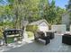 Spacious deck area features a built-in grill, plenty of seating, and an outdoor cooking and seating space at 2224 Clonmel Pl, Charlotte, NC 28262