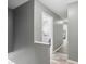 Hallway view with wood-look flooring leading to bedrooms at 2224 Clonmel Pl, Charlotte, NC 28262