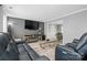 Comfortable living room with a fireplace, stylish furniture, and ample space for relaxation and entertaining at 2224 Clonmel Pl, Charlotte, NC 28262