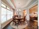 Elegant dining room bathed in natural light, perfect for entertaining and Gathering meals at 2306 Wesley Landing Rd, Waxhaw, NC 28173