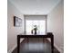 Dining area showcases a large window and a dark wood table on wood floors at 2306 Wesley Landing Rd, Waxhaw, NC 28173
