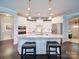 Elegant kitchen showcasing stainless steel appliances, granite countertops, and a central island at 2306 Wesley Landing Rd, Waxhaw, NC 28173