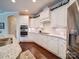 Modern kitchen with stainless steel appliances, granite countertops, and ample cabinet space at 2306 Wesley Landing Rd, Waxhaw, NC 28173
