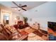 Cozy living room featuring comfortable leather seating and a unique patterned rug at 2306 Wesley Landing Rd, Waxhaw, NC 28173
