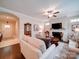 Cozy living room featuring a fireplace and a neutral color palette, perfect for relaxation at 2306 Wesley Landing Rd, Waxhaw, NC 28173