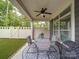 Covered patio with comfortable seating, perfect for outdoor relaxation and entertaining at 2306 Wesley Landing Rd, Waxhaw, NC 28173