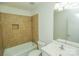 Bathroom with tiled shower and sink with vanity at 2332 Kenmore Ave, Charlotte, NC 28204