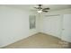 Bedroom features window and ceiling fan at 2332 Kenmore Ave, Charlotte, NC 28204