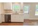 Well-appointed kitchen with stainless steel dishwasher, ample counter space, and natural light at 288 Tram Rd, Lancaster, SC 29720