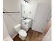 Bathroom with tile floors, white vanity and granite countertop, and a large mirror at 296 Tram Rd, Lancaster, SC 29720