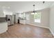 Updated kitchen featuring stainless steel appliances, granite countertops, and white cabinets at 296 Tram Rd, Lancaster, SC 29720