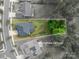 Aerial view of property lines showcasing a private backyard with mature trees at 3017 Winged Teal Ct, Belmont, NC 28012