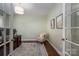 Home office featuring a wooden desk, comfortable chair, and natural light at 3017 Winged Teal Ct, Belmont, NC 28012