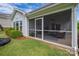 Screened-in porch with ceiling fan and comfortable seating at 3017 Winged Teal Ct, Belmont, NC 28012