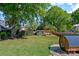 Well-manicured backyard features a sauna, patio area, and landscaping at 3209 Mayfield Ave # 11, Charlotte, NC 28209