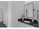 Elegant bathroom with a modern vanity, stylish mirror, and decorative accents, creating a relaxing atmosphere at 3209 Mayfield Ave # 11, Charlotte, NC 28209