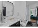 Modern bathroom features a marble countertop, decorative mirror, and patterned shower at 3209 Mayfield Ave # 11, Charlotte, NC 28209
