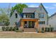 Stunning craftsman home with a welcoming front porch and beautifully landscaped front yard at 3209 Mayfield Ave # 11, Charlotte, NC 28209