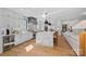 Bright kitchen boasting a long island with seating, wine cooler, and open floor plan at 3209 Mayfield Ave # 11, Charlotte, NC 28209