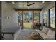 Covered back porch with outdoor seating and grilling area at 3209 Mayfield Ave # 11, Charlotte, NC 28209