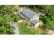 Aerial view of a spacious home with a manicured lawn and mature trees at 323 Richmond Rd, Salisbury, NC 28144