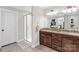 Bright bathroom featuring double sink vanity, shower, and granite countertops at 323 Richmond Rd, Salisbury, NC 28144