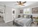 Bedroom featuring a ceiling fan, neutral color scheme and adjacent bathroom access at 323 Richmond Rd, Salisbury, NC 28144