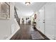 Inviting foyer featuring hardwood floors and staircase at 323 Richmond Rd, Salisbury, NC 28144