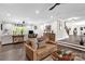 Open concept living room with hardwood floors and neutral walls, with access to multiple areas at 323 Richmond Rd, Salisbury, NC 28144