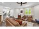 Bright and open living area featuring hardwood flooring and large windows at 323 Richmond Rd, Salisbury, NC 28144
