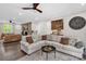 Spacious living room featuring a stone fireplace, hardwood floors, and neutral walls at 323 Richmond Rd, Salisbury, NC 28144