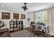 Bright home office with large window, hardwood floors, and ample workspace at 323 Richmond Rd, Salisbury, NC 28144