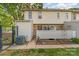 Backyard view of a townhouse with well-maintained lawn and privacy fencing at 3726 Park Rd, Charlotte, NC 28209