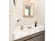 Clean bathroom featuring a granite vanity top and a mirror at 3726 Park Rd, Charlotte, NC 28209