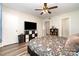 Main bedroom with wood-look floors, a large window, and neutral decor at 3726 Park Rd, Charlotte, NC 28209