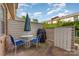 Cozy outdoor patio with seating, umbrella, and a grill at 3726 Park Rd, Charlotte, NC 28209