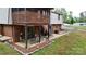 View of back porch, and backyard with fence from elevated perspective at 3816 Redman Rd, Shelby, NC 28150
