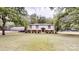 Charming split-level home with manicured lawn and convenient covered parking at 3816 Redman Rd, Shelby, NC 28150