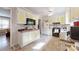 Bright kitchen featuring tile floor, white and yellow cabinets and modern appliances at 3816 Redman Rd, Shelby, NC 28150