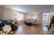 Inviting living room with hardwood floors, large window, and comfortable seating at 3816 Redman Rd, Shelby, NC 28150