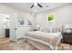 Well-appointed bedroom featuring decor art and a comfortable bed at 403 Broad St, Kannapolis, NC 28081