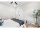 Bedroom with a ceiling fan, two closets, and contemporary decor at 403 Broad St, Kannapolis, NC 28081