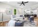 Open-concept living room with modern decor, seamlessly connected to the kitchen at 403 Broad St, Kannapolis, NC 28081