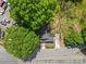 Aerial view of a home with mature trees and a long driveway, close to a railroad track at 4304 S Falls St, Gastonia, NC 28056