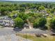 Top-down shot of a gray house close to train tracks, also showing a car lot nearby at 4304 S Falls St, Gastonia, NC 28056