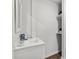 Bright bathroom with a modern vanity and floating shelves at 4304 S Falls St, Gastonia, NC 28056