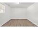Minimalist bedroom with hardwood floors, a window, and ample natural light at 4304 S Falls St, Gastonia, NC 28056